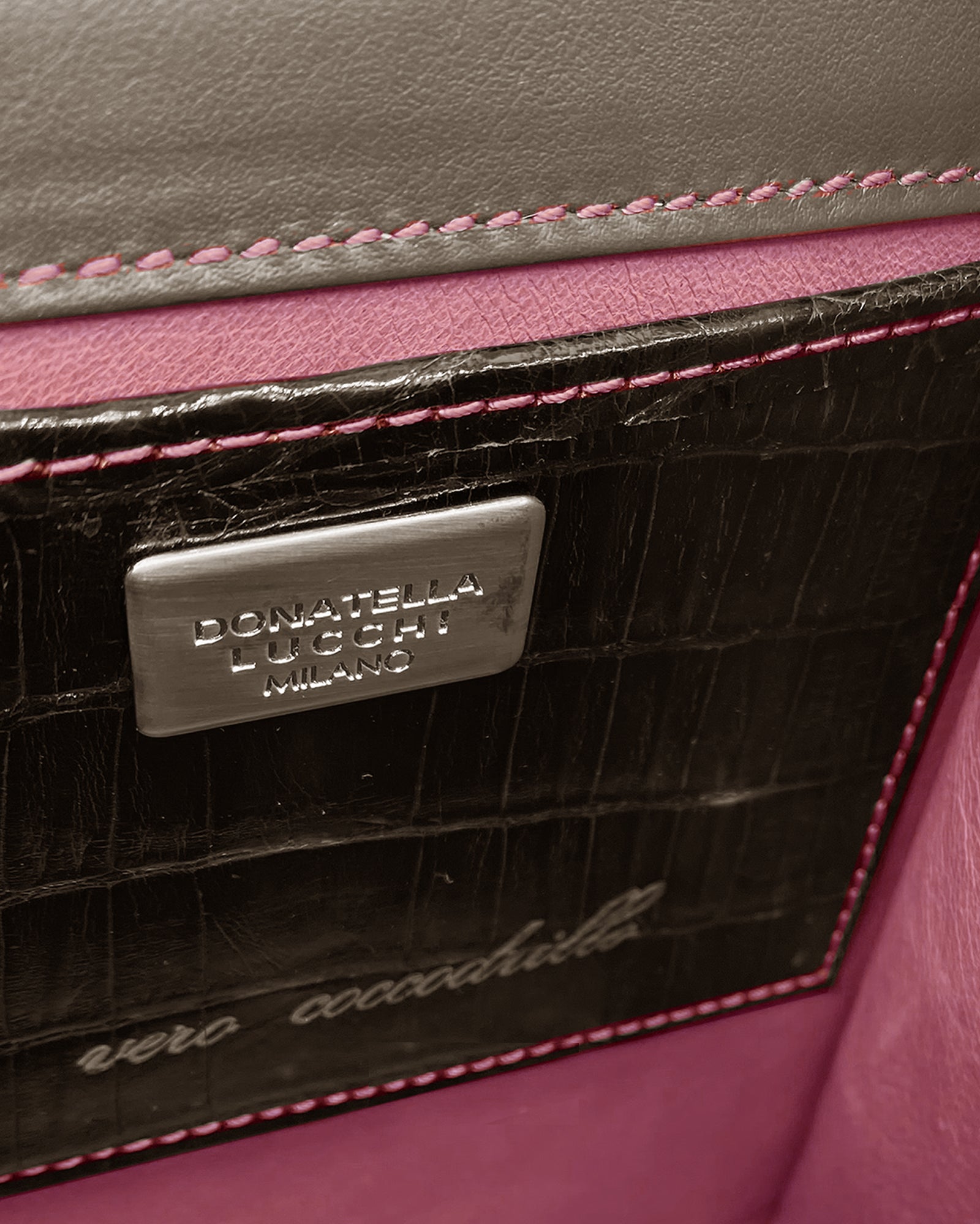 SISSI - COCCO RECYCLE interior detail showcasing suede and crocodile leather craftsmanship.