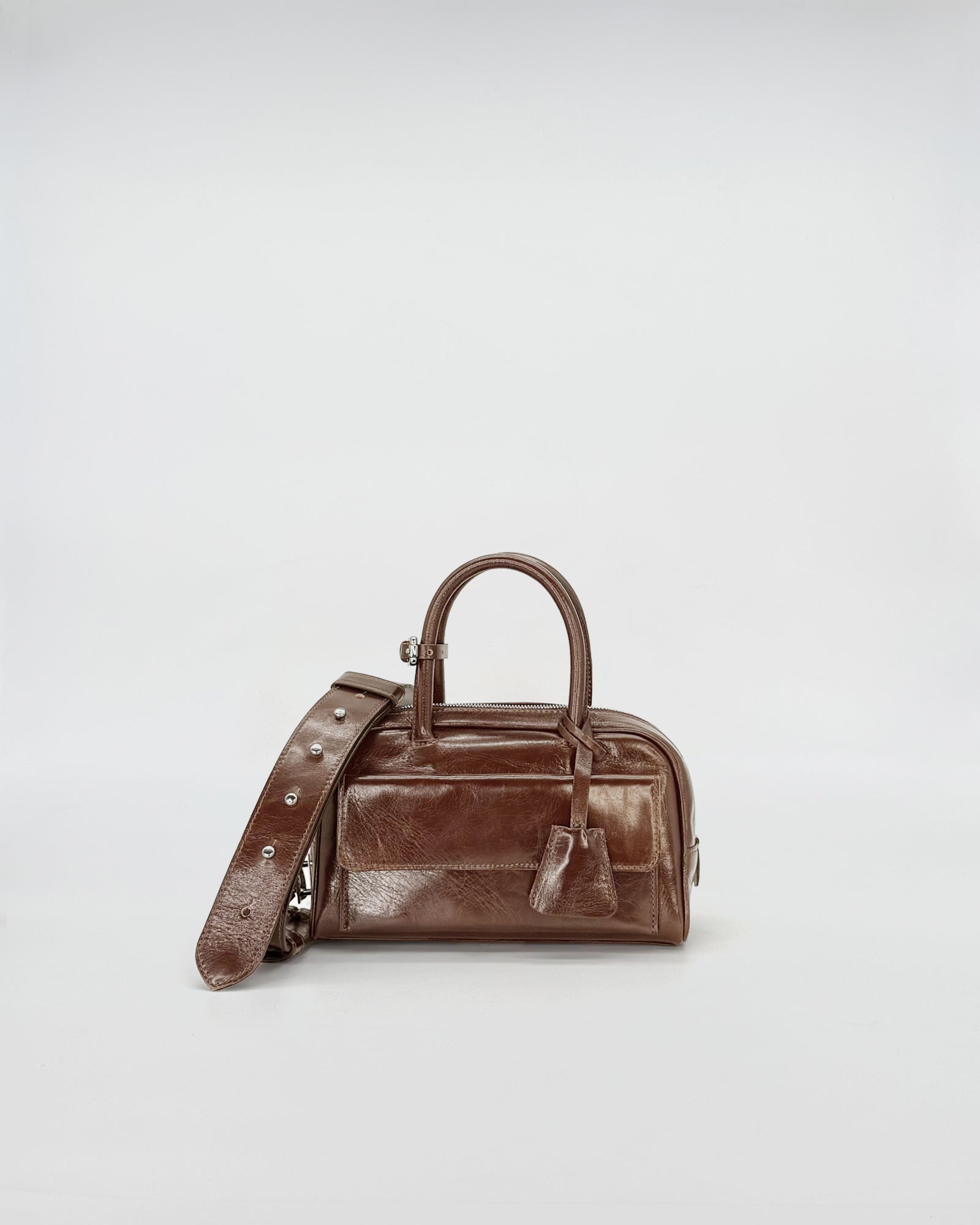Zoe Mini Vitello Semilucido handbag in brown with a detachable strap, perfect for stylish and compact accessorizing.