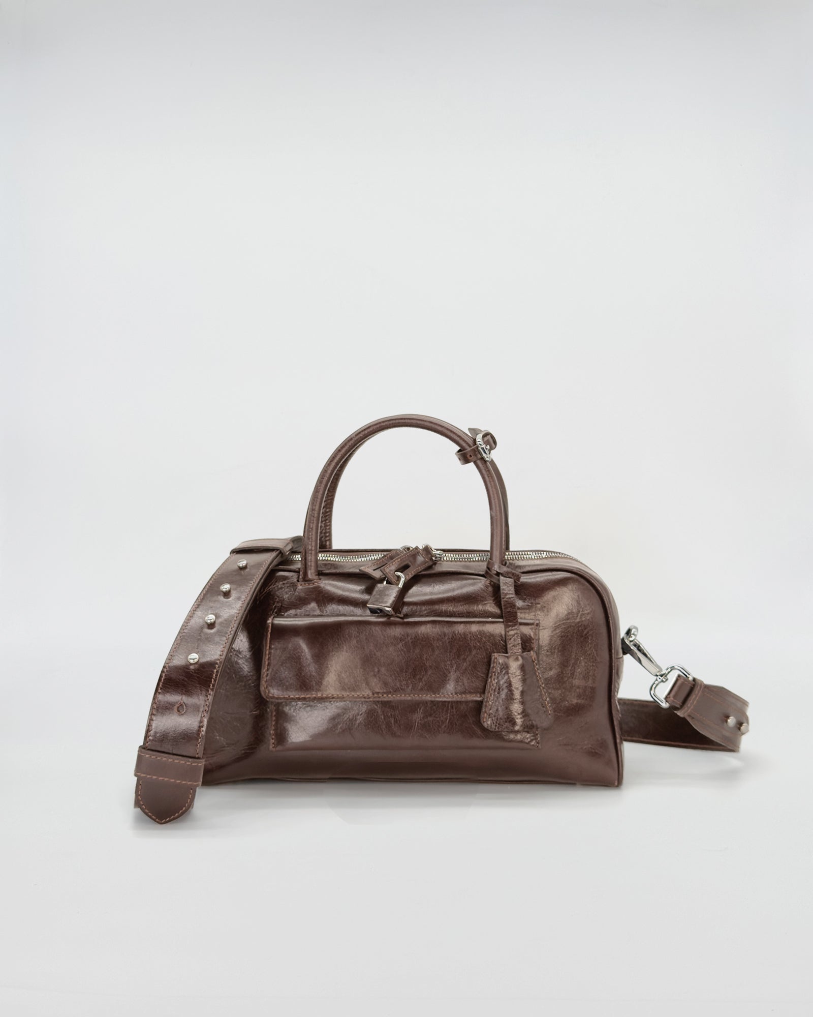 Zoe small vitello semilucido handbag in brown leather, featuring a versatile design for everyday use.