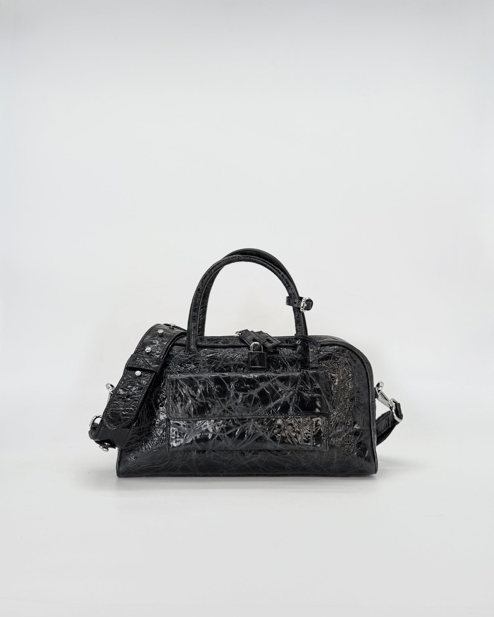 Zoe Small Vitello Strizzato handbag, a stylish black accessory with clean lines and versatile design for everyday use.